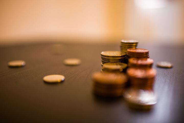 stacks of coins on a desk